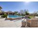 Inviting swimming pool featuring an integrated spa and a basketball hoop at 9801 Orient Express Ct, Las Vegas, NV 89145