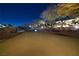 Dusk view of putting green at 9801 Orient Express Ct, Las Vegas, NV 89145