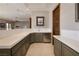 A bar area featuring modern countertops, stainless steel appliances, and plenty of cabinet space at 9801 Orient Express Ct, Las Vegas, NV 89145