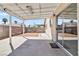 This backyard features a covered patio with a block wall surround at , Las Vegas, NV 89108
