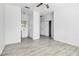Spacious bedroom with wood-style floors, closet and ensuite bathroom at , Las Vegas, NV 89108