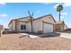 Charming single-story home with low-maintenance landscaping and a two-car garage at , Las Vegas, NV 89108