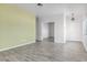 Open-concept living area with tile flooring, light walls, and access to other rooms at , Las Vegas, NV 89108