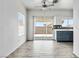 Open living space featuring tile floors, a ceiling fan, and backyard views at , Las Vegas, NV 89108