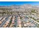 Expansive aerial view of the community featuring houses near the Eagle Crest and Highland Falls golf courses at 10408 Georgetown Pl, Las Vegas, NV 89134