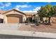 Charming single-story home featuring a two-car garage and drought-tolerant landscaping at 10408 Georgetown Pl, Las Vegas, NV 89134