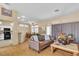 Spacious living room with hardwood floors, comfortable seating, and an open layout at 10408 Georgetown Pl, Las Vegas, NV 89134