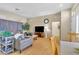 Cozy living room with hardwood floors and neutral paint colors, offering a comfortable living space at 10408 Georgetown Pl, Las Vegas, NV 89134