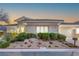 Charming single-story home featuring a beautifully landscaped front yard with desert landscaping at 11321 Golden Chestnut Pl, Las Vegas, NV 89135