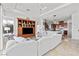 Open-concept living area with eat in kitchen and built-in media center at 11321 Golden Chestnut Pl, Las Vegas, NV 89135