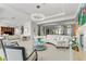 Open-concept living room featuring a modern chandelier and neutral decor at 11321 Golden Chestnut Pl, Las Vegas, NV 89135