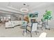 Bright living room with a fireplace and elegant chandelier lighting fixture at 11321 Golden Chestnut Pl, Las Vegas, NV 89135