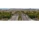 Beautiful aerial view showcasing the meticulously planned entrance to the community with mature landscaping at 1269 Olivia Pkwy, Henderson, NV 89011