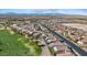 Expansive aerial view showcasing the neighborhood, golf course, and proximity to Harry Reid Airport and the Las Vegas Strip at 1269 Olivia Pkwy, Henderson, NV 89011