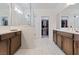 Bright bathroom with double vanity, walk-in shower, and walk-in closet at 1269 Olivia Pkwy, Henderson, NV 89011