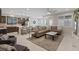 Open floor plan combining living and kitchen areas, with a sectional sofa and modern finishes at 1269 Olivia Pkwy, Henderson, NV 89011