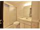 Cozy bathroom featuring a shower, toilet, and single vanity with a marble countertop at 1413 Culley St, Las Vegas, NV 89110