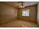 Small bedroom with a window providing natural light and a ceiling fan at 1413 Culley St, Las Vegas, NV 89110
