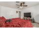 Bedroom featuring a ceiling fan, large closet, and television at 1924 S 6Th St, Las Vegas, NV 89104
