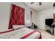 Bedroom featuring a tiled floor, curtains, and television at 1924 S 6Th St, Las Vegas, NV 89104