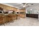 Spacious kitchen with counter seating and an open view to the living room area at 1924 S 6Th St, Las Vegas, NV 89104