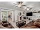 Spacious living room with a fireplace, tile flooring, and sliding glass doors at 1924 S 6Th St, Las Vegas, NV 89104