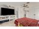 Spacious main bedroom with TV, ceiling fan and large closet; bright and airy atmosphere at 1924 S 6Th St, Las Vegas, NV 89104