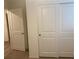 This image showcases a bright bedroom closet with a pair of modern doors at 1926 Neoga St, Las Vegas, NV 89115