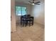 Cozy dining area with tile flooring and a ceiling fan at 1926 Neoga St, Las Vegas, NV 89115