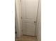 This hallway corner shows a door with molding and neutral-color flooring at 1926 Neoga St, Las Vegas, NV 89115