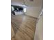View of the home's living room area, with hardwood floors and ceiling fan at 1926 Neoga St, Las Vegas, NV 89115