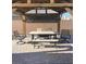 Outdoor patio seating area under a pergola with a brick-paved surface at 1926 Neoga St, Las Vegas, NV 89115