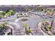 Aerial view of the community pool and surrounding landscaping showcasing community amenities at 2175 Limestone Cove Ct, Laughlin, NV 89029