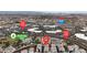 An aerial view of attached homes near Saint Rose Pkwy, Paseo Verde Pkwy, the 215, and Paseo Vista Park at 2572 Favorable Pointe Ct, Henderson, NV 89052