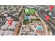An aerial view of attached homes near Paseo Vista Park, Saint Rose Pkwy, and Paseo Verde Pkwy at 2572 Favorable Pointe Ct, Henderson, NV 89052
