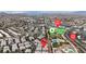 An aerial view of attached homes near the cross streets of Saint Rose and Paseo Verde Pkwy, and Paseo Vista Park at 2572 Favorable Pointe Ct, Henderson, NV 89052
