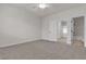 Bedroom featuring plush carpeting and an ensuite bathroom at 2572 Favorable Pointe Ct, Henderson, NV 89052