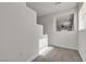 A room with carpeted steps, a ceiling fan, and natural light at 2572 Favorable Pointe Ct, Henderson, NV 89052