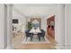 Dining room with hardwood floors, columns, and stylish furnishings at 2694 Caumsett Ct, Las Vegas, NV 89117