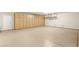 Garage with large storage cabinets and an overhead rack, perfect for keeping things organized and off the floor at 2694 Caumsett Ct, Las Vegas, NV 89117