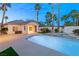 Backyard pool area featuring a detached structure, spa, and beautiful landscaping at 2694 Caumsett Ct, Las Vegas, NV 89117