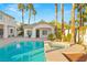 Relaxing pool and spa area with a detached structure, perfect for entertaining guests outdoors at 2694 Caumsett Ct, Las Vegas, NV 89117