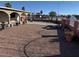 A view of the front yard with space for many plants along the side of the home in a rocked garden area at 2700 Spear St, North Las Vegas, NV 89030