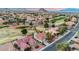 Gorgeous aerial view of a community near the golf course with mountain views at 2817 Billy Casper Dr, Las Vegas, NV 89134