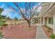 Beautiful backyard featuring a covered patio and view of the golf course at 2817 Billy Casper Dr, Las Vegas, NV 89134