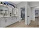 This contemporary bathroom features double sinks and a glass enclosed shower at 2817 Billy Casper Dr, Las Vegas, NV 89134