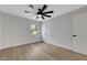 A well-lit bedroom includes a window and a ceiling fan at 2817 Billy Casper Dr, Las Vegas, NV 89134