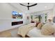 Bedroom features a linear fireplace and king size bed with soft pillows at 2817 Billy Casper Dr, Las Vegas, NV 89134