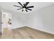 A bright bedroom features a window and light-colored wood-look floors at 2817 Billy Casper Dr, Las Vegas, NV 89134
