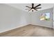 A naturally lit bedroom features a window and a modern ceiling fan at 2817 Billy Casper Dr, Las Vegas, NV 89134